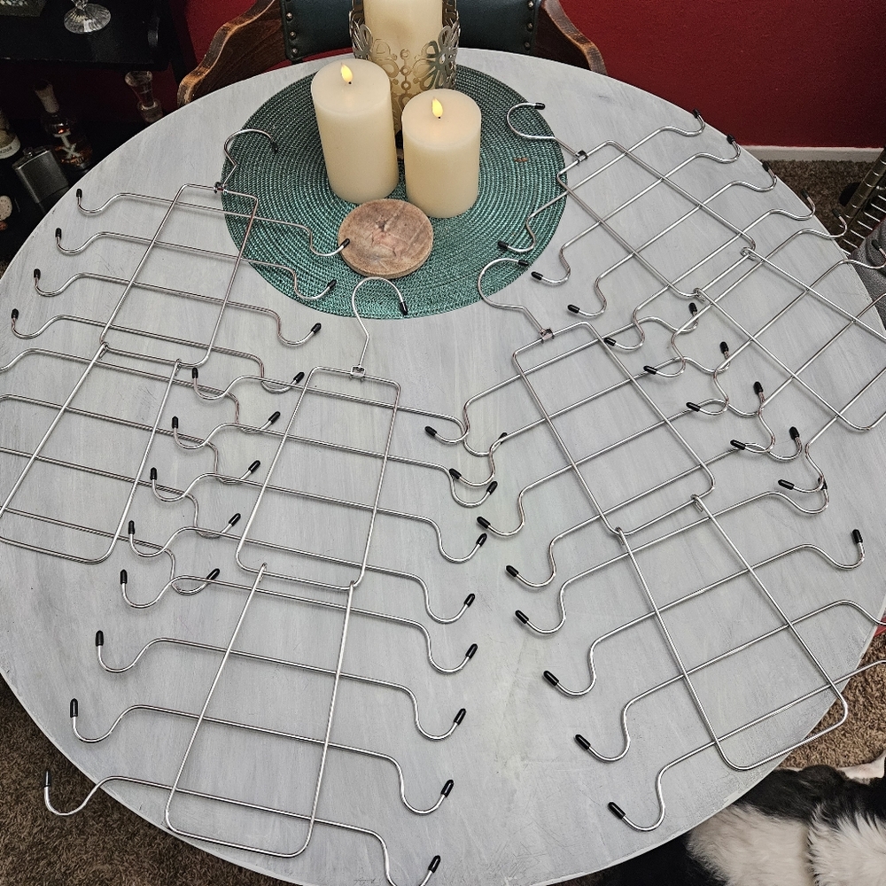 4 Hangers with multiple Hangers in one. They are $8 for each one and there are 4
